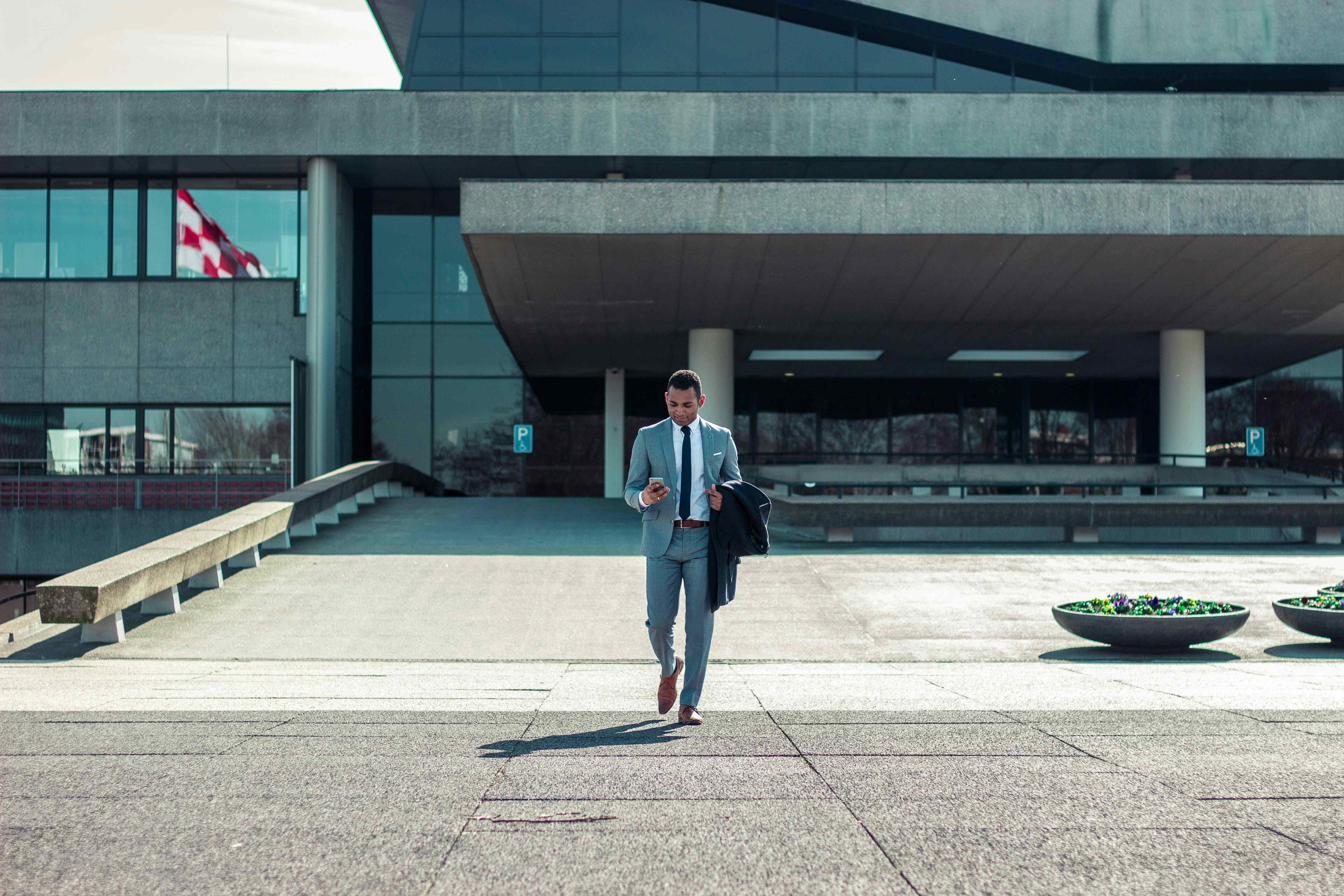 Man leaving an office building